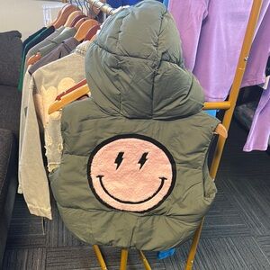 Green Puffer Vest with Pink Smiley Face